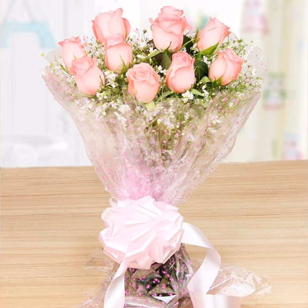 Pink roses with a heart shape chocolate truffle cake delivery at home