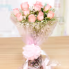 Pink roses with a heart shape chocolate truffle cake delivery at home