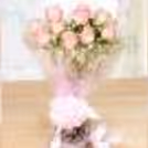Pink roses with a heart shape chocolate truffle cake delivery at home