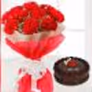 Red carnations with chocolate truffle cake by cherishx