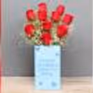 10 red roses box with a chocolate truffle cake by cherishx