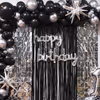 Free-floating balloons and the age digit foil balloons mix shapes and styles for Birthday