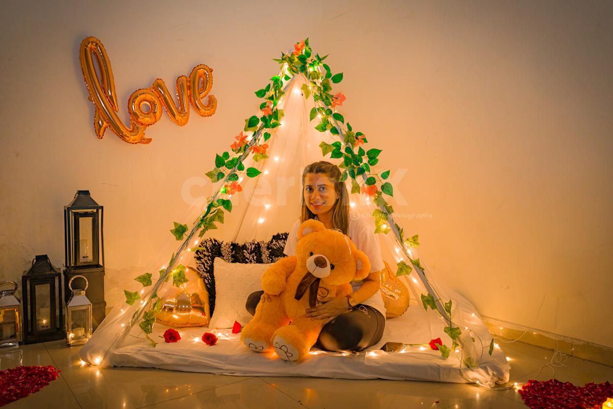 Flower Petals, Candle Decorations & Rose Gold Balloons with Canopy.