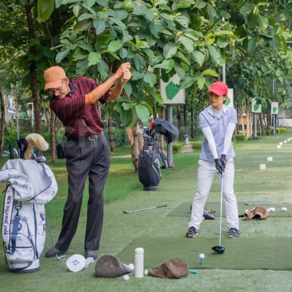 A man in his late 60s enjoying Golf.