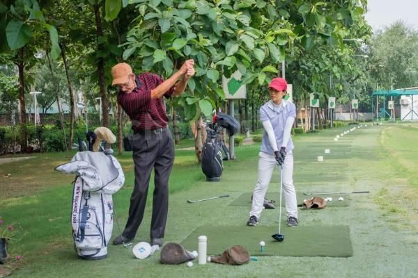 A man in his late 60s enjoying Golf.