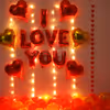 Romantic Balloon Decoration with I LOVE YOU foil balloons, heart shaped foil balloons and fairy lights