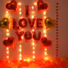 Romantic Balloon Decoration with I LOVE YOU foil balloons, heart shaped foil balloons and fairy lights