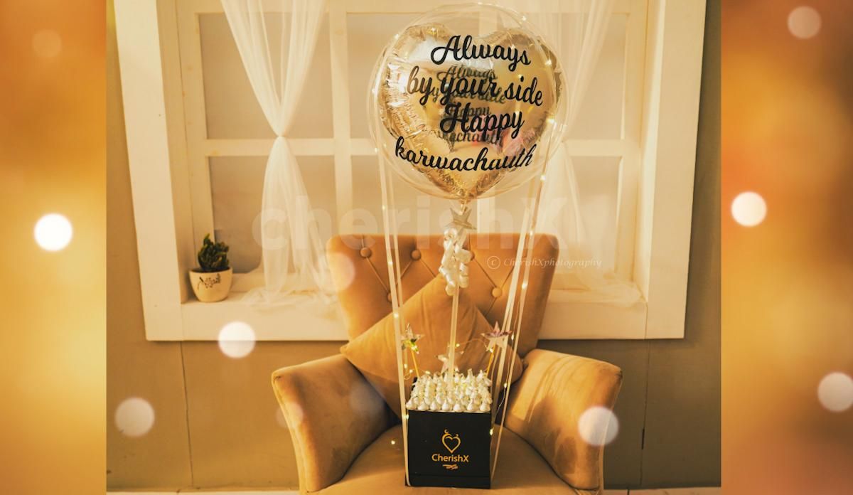 Express your love by gifting this Classy Silver heart bucket with Kisses to your wifey.