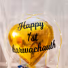 A Bubble Balloon with a Golden Heart-shaped foil balloon.