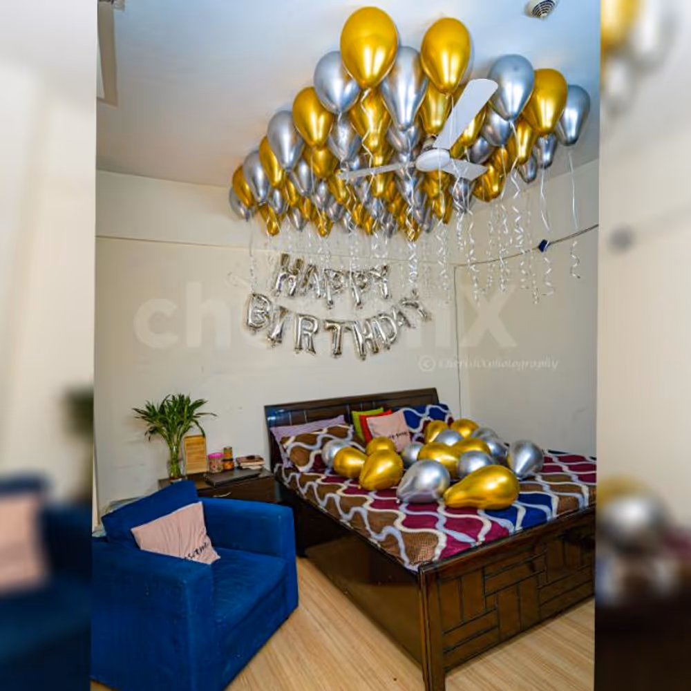 Golden and silver chrome balloon decoration by Cherishx at INR 2199