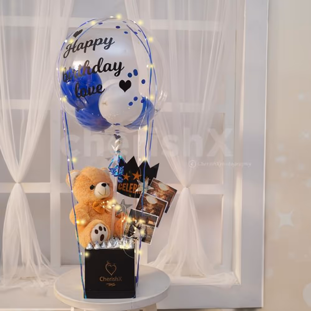 A cute teddy and chocolate box bucket to gift to your close ones.