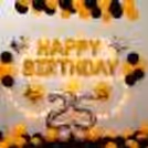 Happy Birthday wall decoration with a Golden and black theme.
