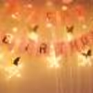 White Net Cloth & Star LED Lights are used in this theme Decoration for Room.