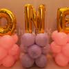 ONE Foil Balloon Letters in Golden to make the decor attractive!