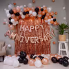 Balloon Decoration for Anniversary with Rosegold, Black and White Balloons