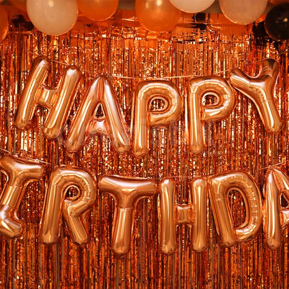 Rose Gold Happy Birthday Foil Balloons to enhance the room decor.