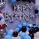 Surprise your kid with this balloons filled Birthday room decor.