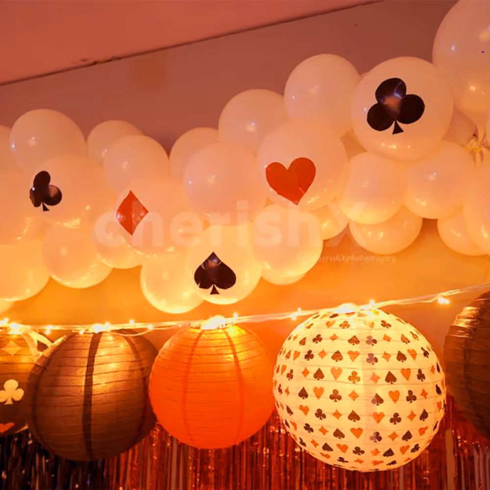 White balloon bunches stick together with 16 card stickers on them.