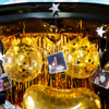 A Car Boot Decor offered by CherishX filled with balloons and personalised photos.