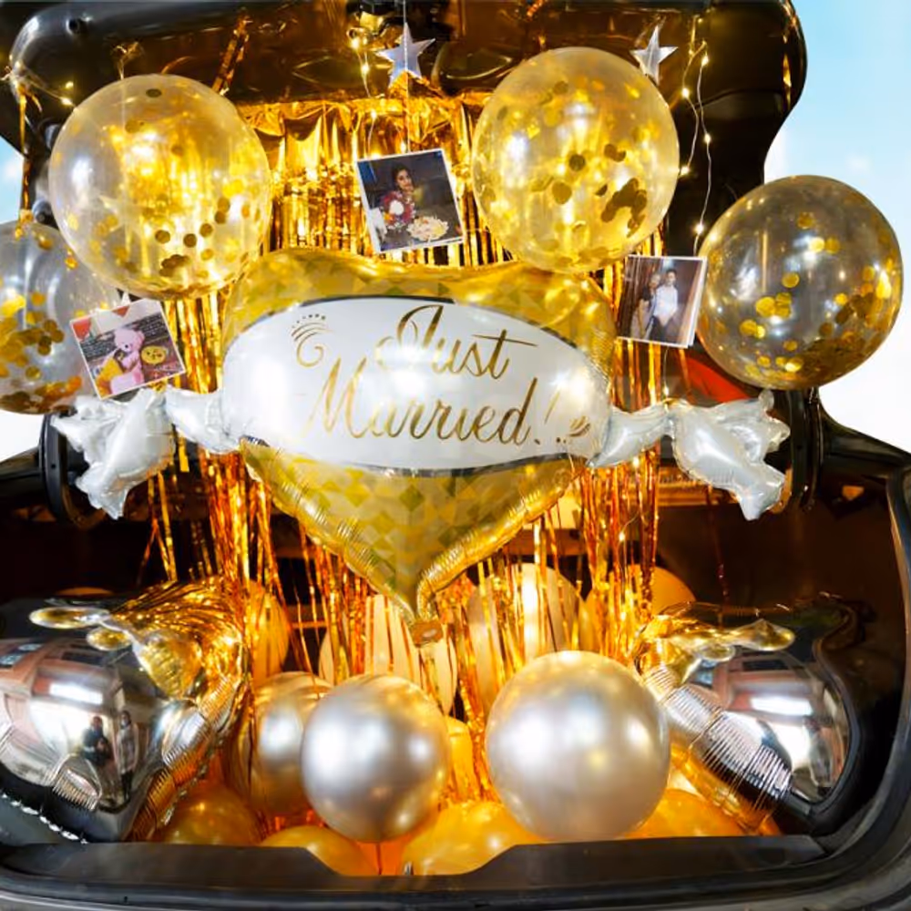 A Car Boot Decor filled with Balloons, photos and lights.