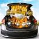 A fulfilling Car Boot Decor with balloons, lights and photos.