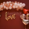 Hear shape balloons in silver, rose gold and red