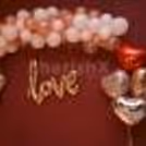 Hear shape balloons in silver, rose gold and red