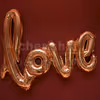 cursive love balloon in rosegold color