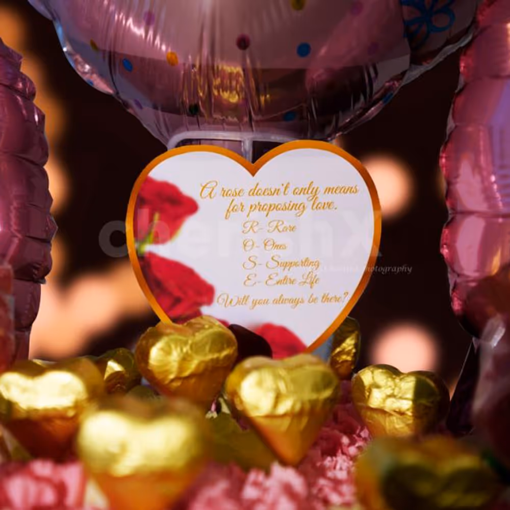 Wish your partner with chocolates and flowers by booking this cute Pink Colored Rose Day Bucket!
