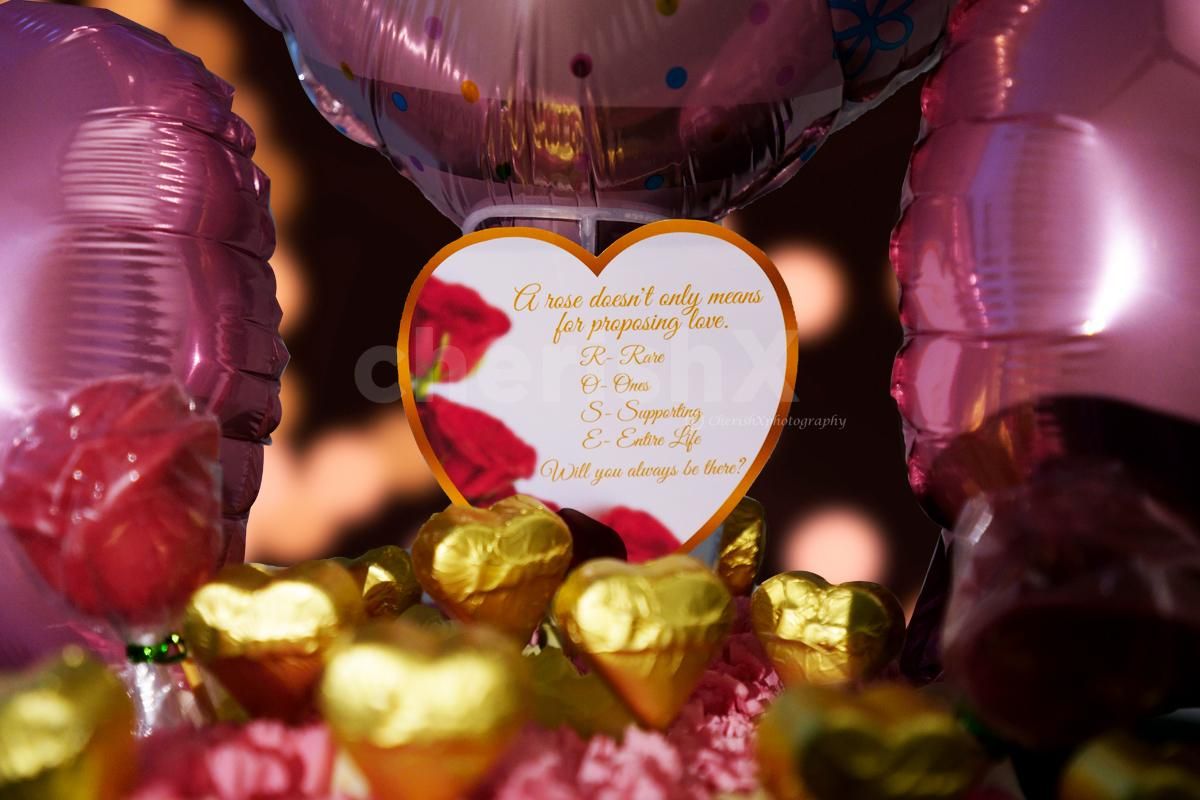 Wish your partner with chocolates and flowers by booking this cute Pink Colored Rose Day Bucket!