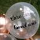 A printed vinyl promise on helium confetti balloons.