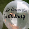 "Be Friends for lifelong" a promise printed on a helium confetti balloon.