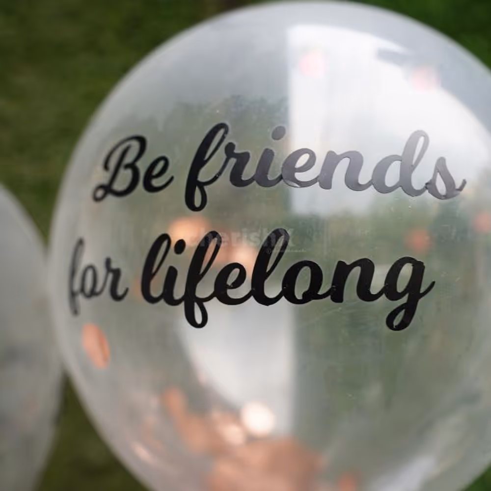 "Be Friends for lifelong" a promise printed on a helium confetti balloon.