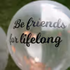 "Be Friends for lifelong" a promise printed on a helium confetti balloon.