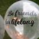 "Be Friends for lifelong" a promise printed on a helium confetti balloon.