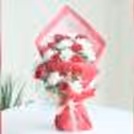 Premium red roses and white carnations decor, perfect for Valentine's Day and special romantic occasions.