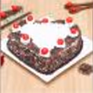 Delicious Heart-Shape Black Forest Cake Half Kg freshly baked for your sweet celebrations.