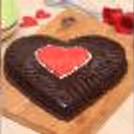 Heart Shaped Truffle Love Cake Half Kg with rich chocolate goodness and smooth texture.