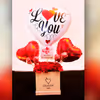 A captivating Red Carnations Love Balloon Bucket to captivate your loved one's heart!