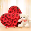 A 25 Red Rose arrangement in a heart shape and a 6' ft white teddy.