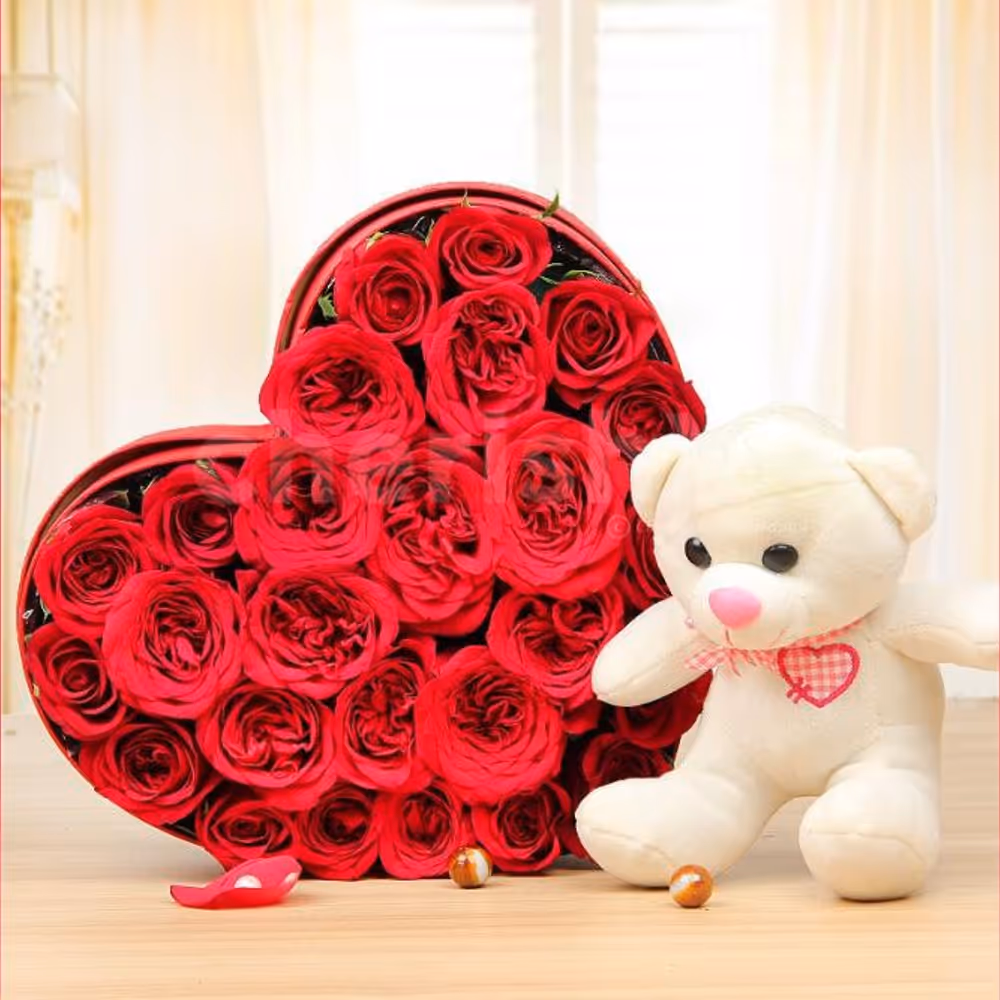 A 25 Red Rose arrangement in a heart shape and a 6' ft white teddy.