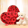A 25 Red Rose arrangement in a heart shape and a 6' ft white teddy.