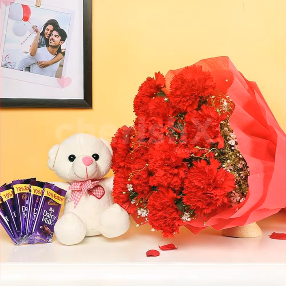 A Combo with 10 red carnations with 5 dairy milk chocolates and a 6' ft cute teddy.