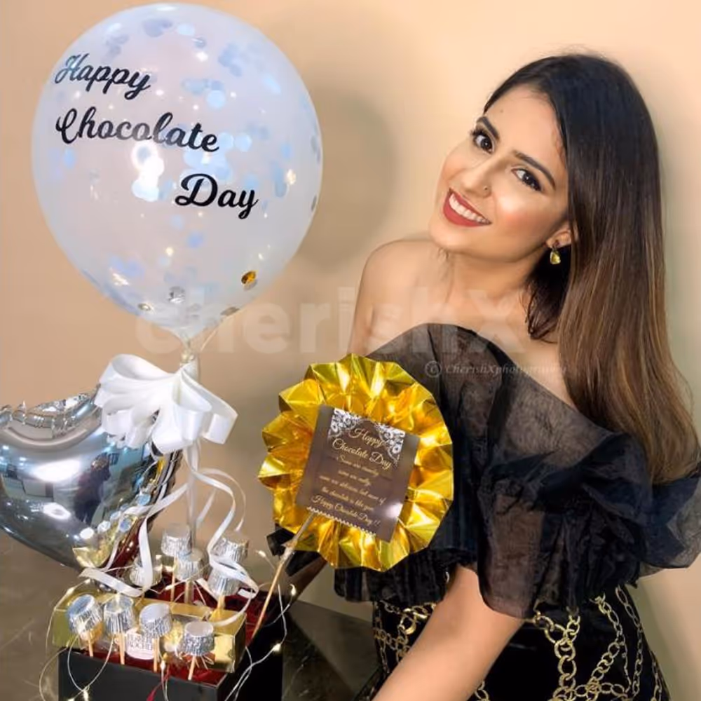 A customer with CherishX's Delightful Chocolate Bucket.