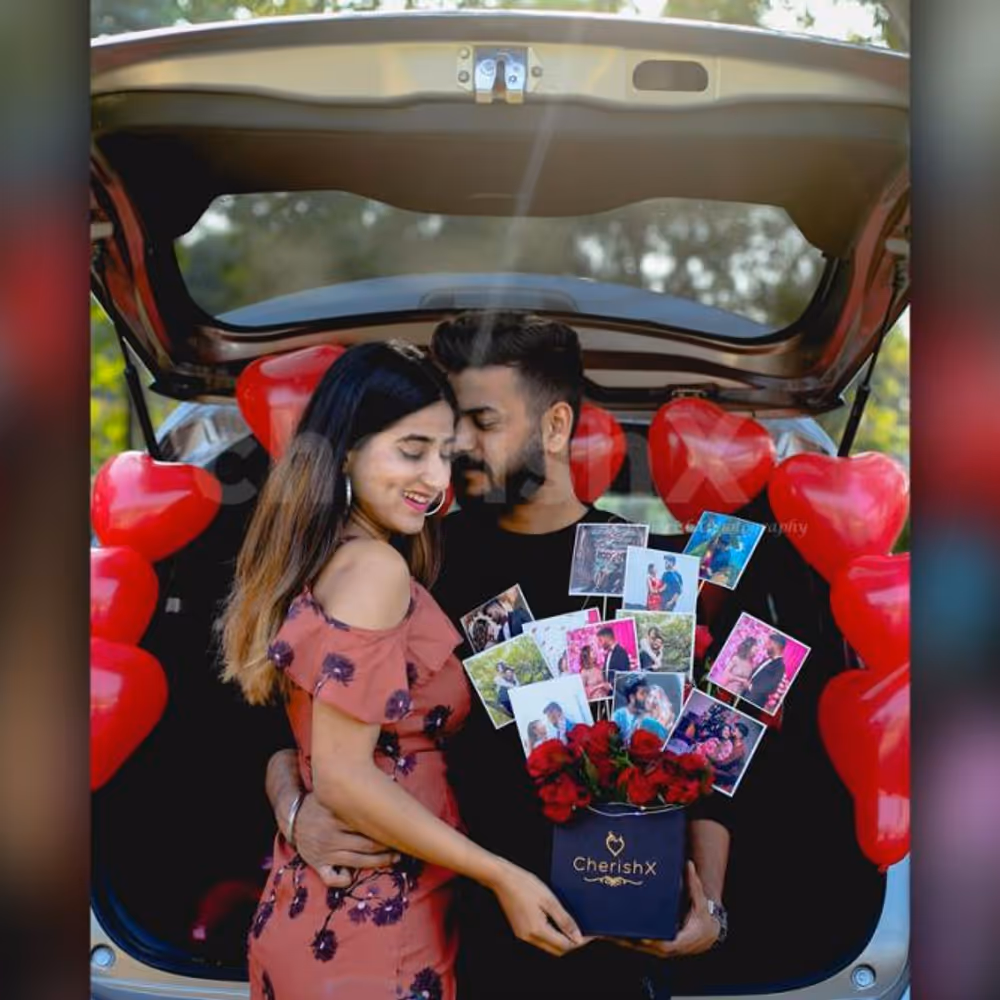 A loving couple with CherishX's Rose Bucket with photos.