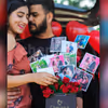 A couple with CherishX's rose bucket.