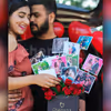 A couple with CherishX's rose bucket.