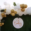 Celebrate the birth of your child with this loving CherishX's Golden and White Baby Shower Decor!