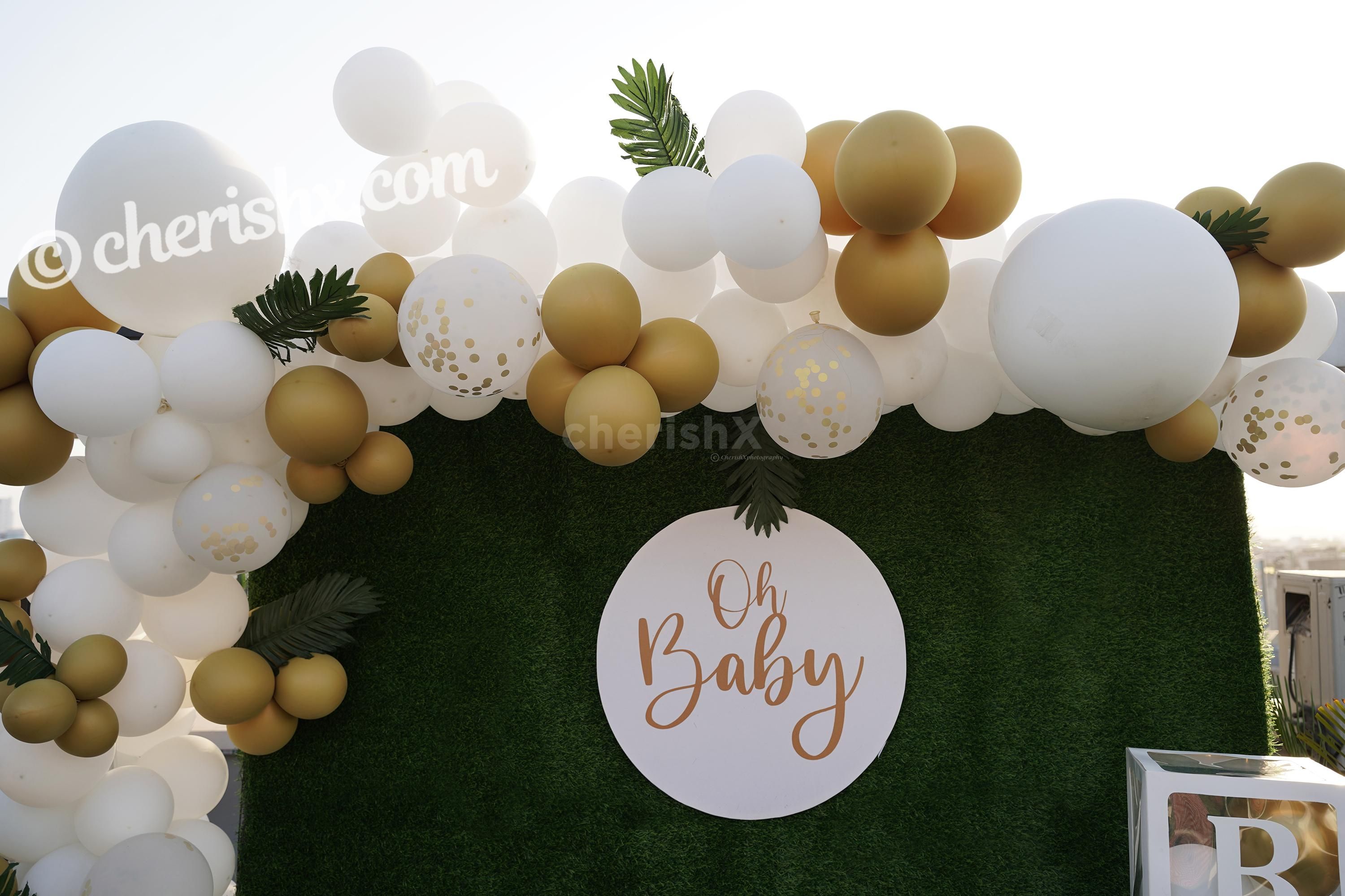 Celebrate the birth of your child with this loving CherishX's Golden and White Baby Shower Decor!