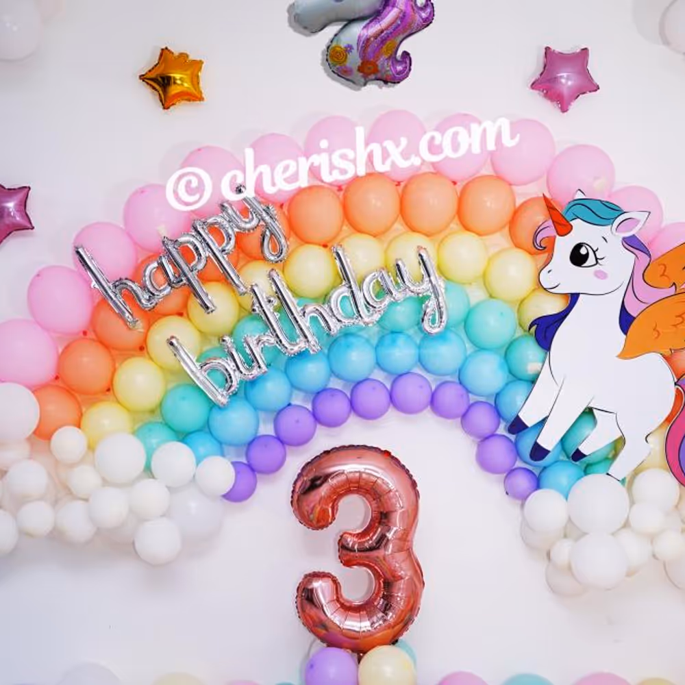 Throw a party to celebrate your child's birthday with colourful unicorn balloon decoration.